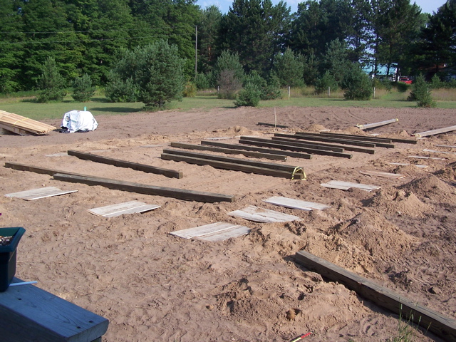 20040802_LandScrapedLumerLaidOutHolesCovered